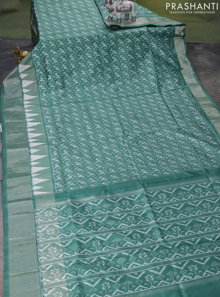 Pochampally silk saree pastel green with allover ikat weaves and silver zari woven border