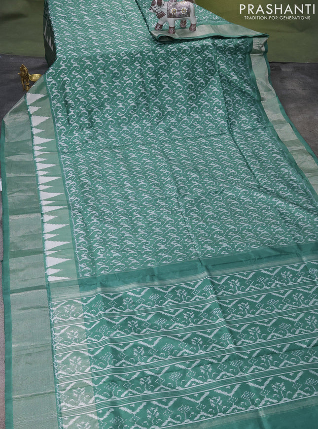 Pochampally silk saree pastel green with allover ikat weaves and silver zari woven border