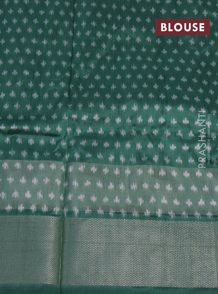 Pochampally silk saree pastel green with allover ikat weaves and silver zari woven border