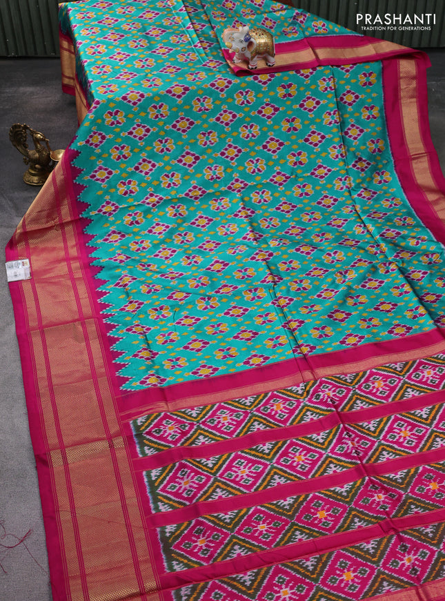 Pochampally silk saree teal green and pink with allover ikat weaves and long zari woven border