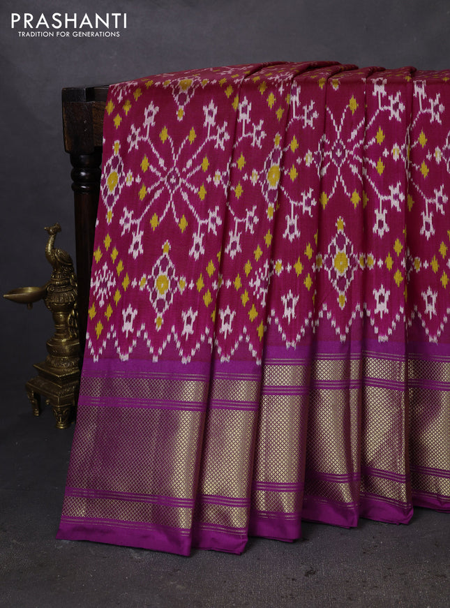 Pochampally silk saree magenta pink and purple with allover ikat weaves and long zari woven border
