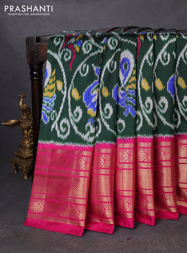 Pochampally silk saree green and pink with allover ikat weaves and long zari woven annam border