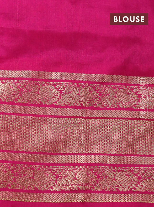 Pochampally silk saree green and pink with allover ikat weaves and long zari woven annam border