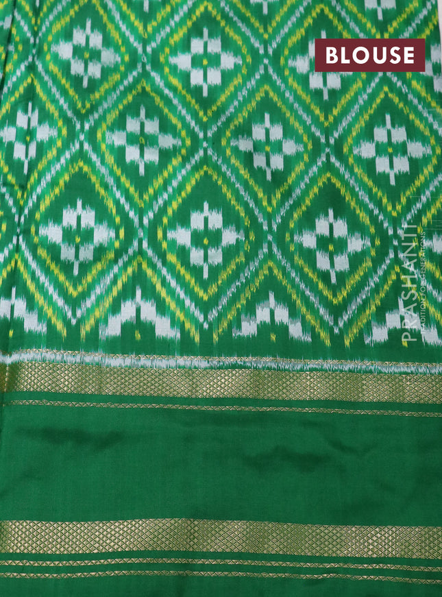 Pochampally silk saree off white and green with plain body and temple design zari woven border