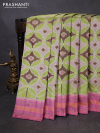 Pochampally silk saree pista green and mauve pink with allover ikat weaves and simple border