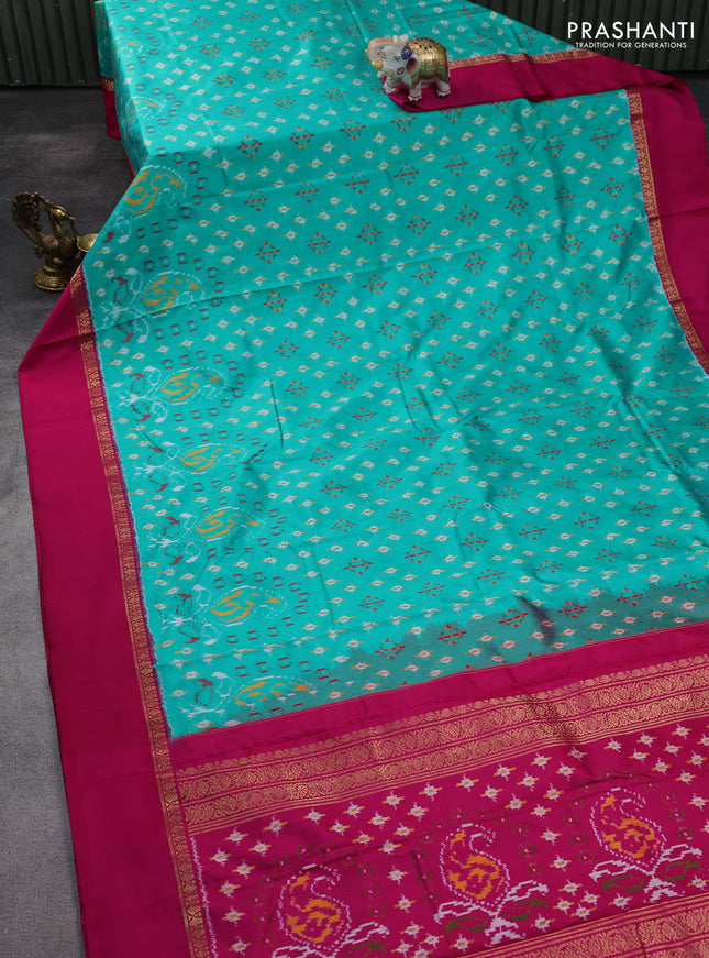 Pochampally silk saree teal green and pink with allover ikat weaves and zari woven simple border