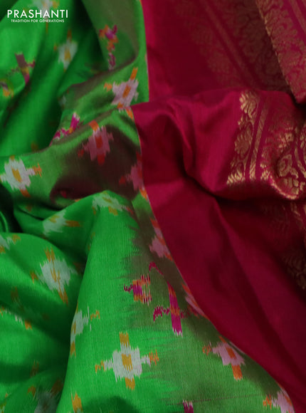 Pochampally silk saree parrot green and magenta pink with allover ikat weaves and zari woven simple border