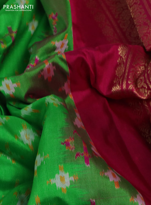 Pochampally silk saree parrot green and magenta pink with allover ikat weaves and zari woven simple border