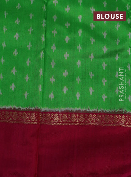 Pochampally silk saree parrot green and magenta pink with allover ikat weaves and zari woven simple border