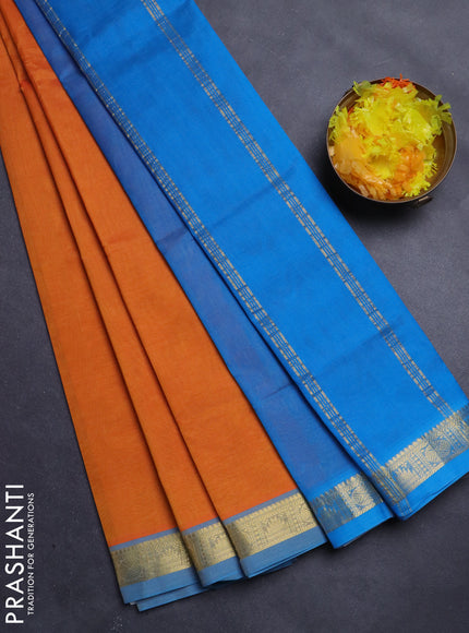 Silk Cotton saree orange and cs blue with plain body and zari woven border