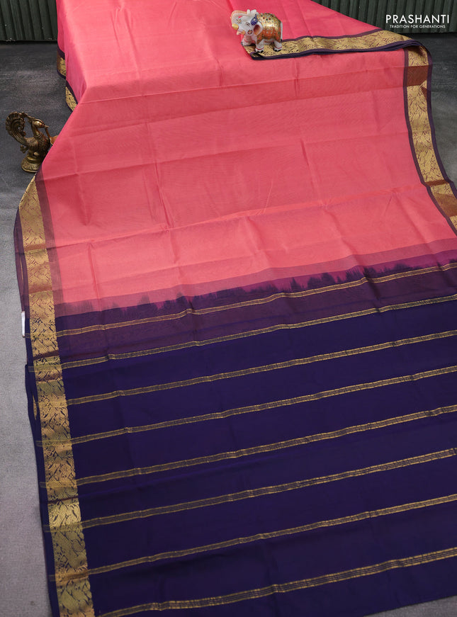 Silk Cotton saree peach pink and navy blue with plain body and zari woven border