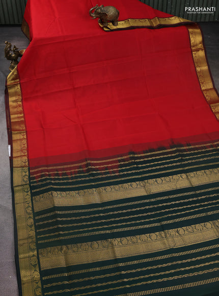 Silk Cotton saree red and bottle green with plain body and zari woven border