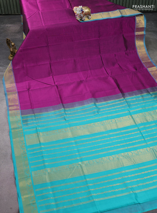 Silk Cotton saree purple and teal blue with plain body and zari woven border
