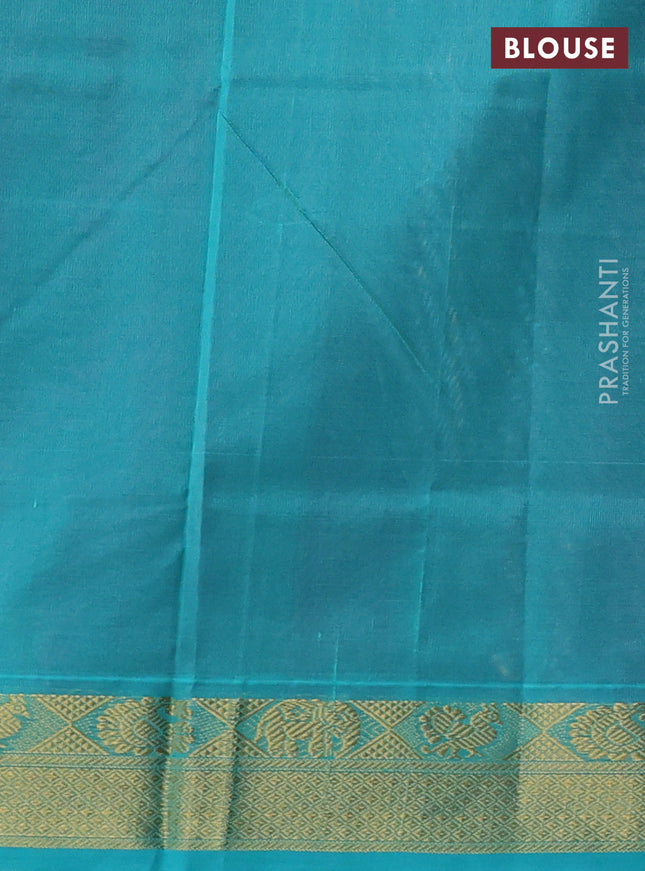 Silk Cotton saree purple and teal blue with plain body and zari woven border