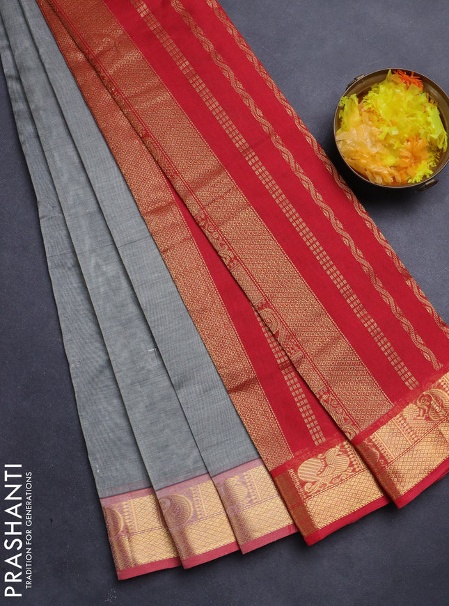 Silk Cotton saree grey and red with plain body and zari woven border