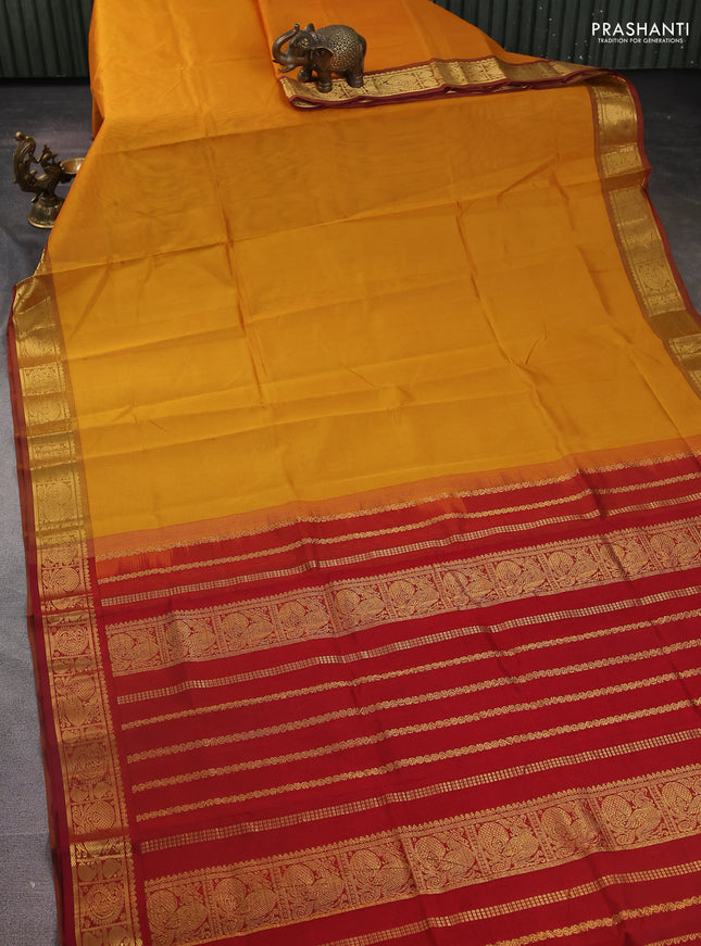 Silk Cotton saree mango yellow and red with plain body and zari woven border