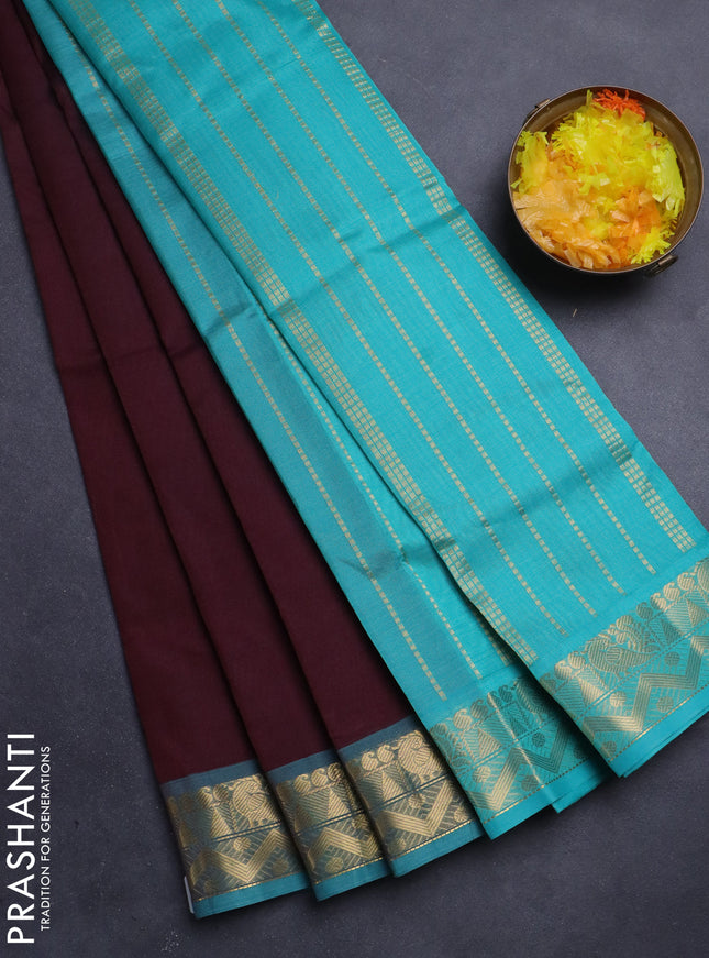 Silk Cotton saree deep maroon and teal blue with plain body and zari woven border