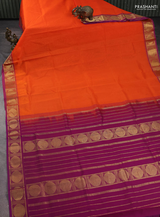 Silk Cotton saree orange and purple with plain body and rudhraksha zari woven border