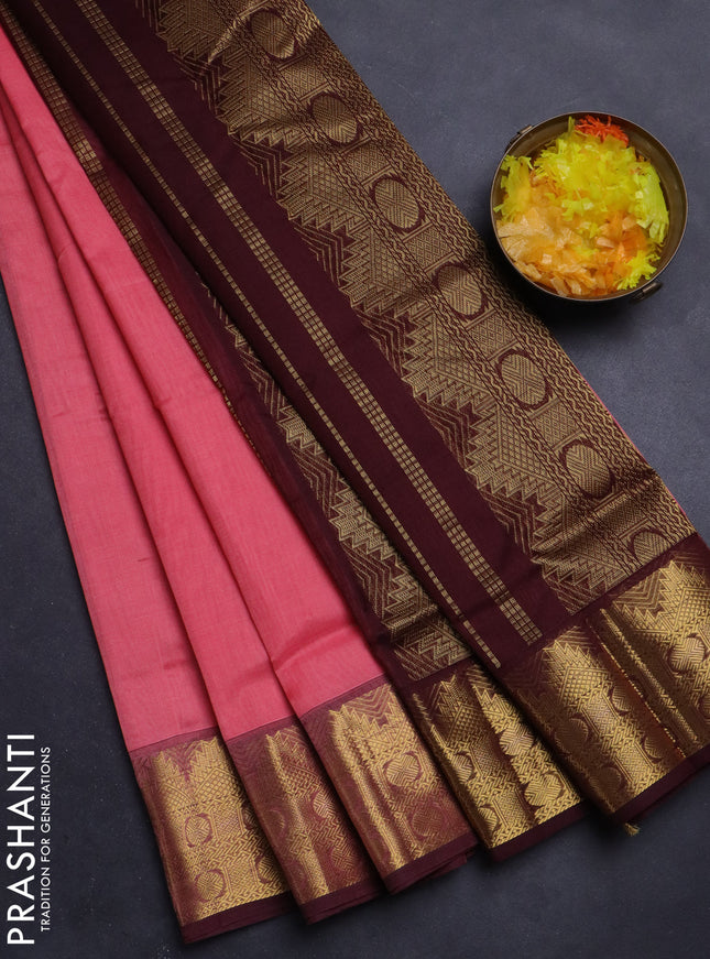 Silk Cotton saree peach pink and deep maroon with plain body and zari woven border