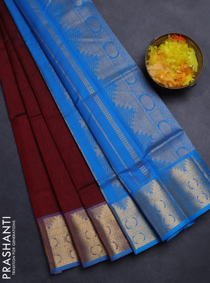 Silk Cotton saree maroon and cs blue with plain body and zari woven border
