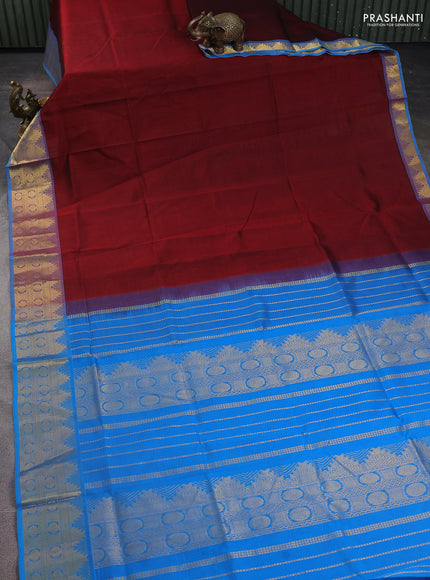 Silk Cotton saree maroon and cs blue with plain body and zari woven border