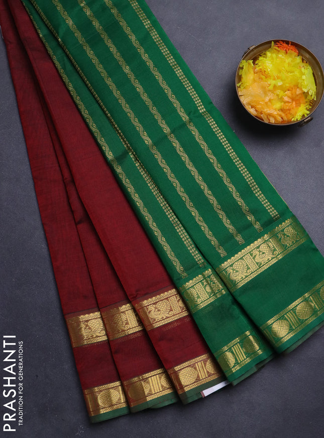 Silk Cotton saree maroon and green with plain body and rettapet zari woven border