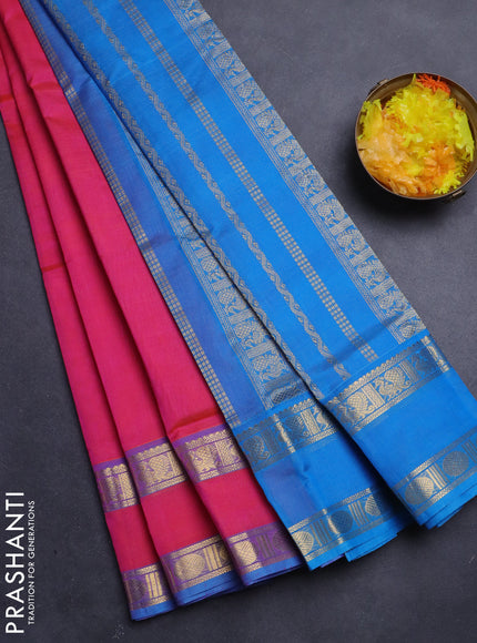 Silk Cotton saree dual shade of pinkish orange and cs blue with plain body and rettapet zari woven border