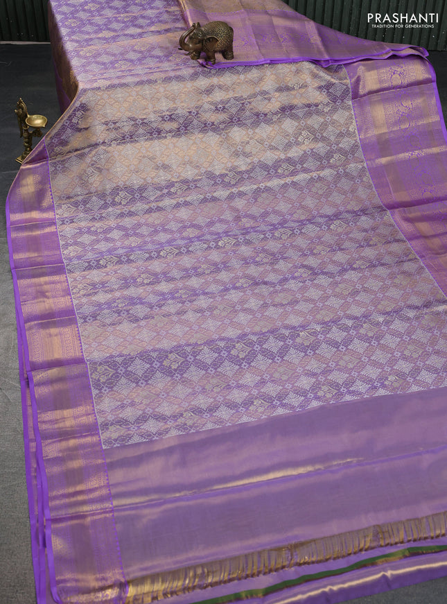 Pure kanchipuram tissue silk saree lavender shade with allover zari woven brocade weaves and zari woven border