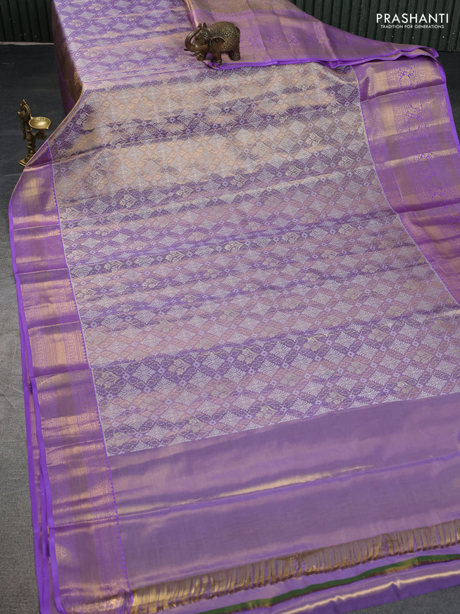 Pure kanchipuram tissue silk saree lavender shade with allover zari woven brocade weaves and zari woven border