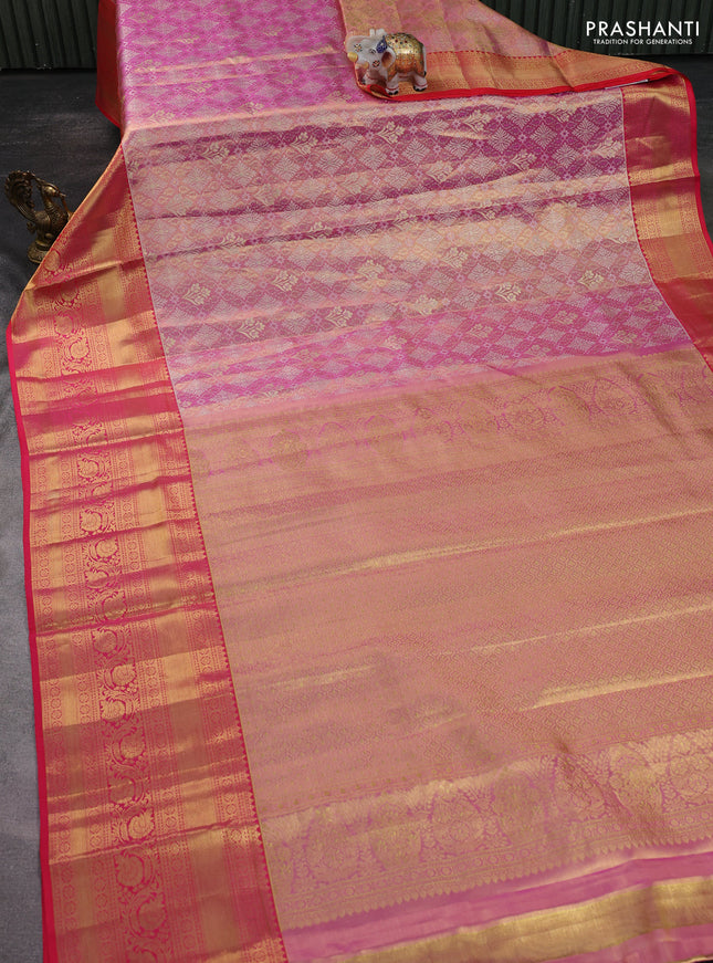 Pure kanchipuram tissue silk saree light pink and peach pink with allover zari woven brocade weaves and zari woven border