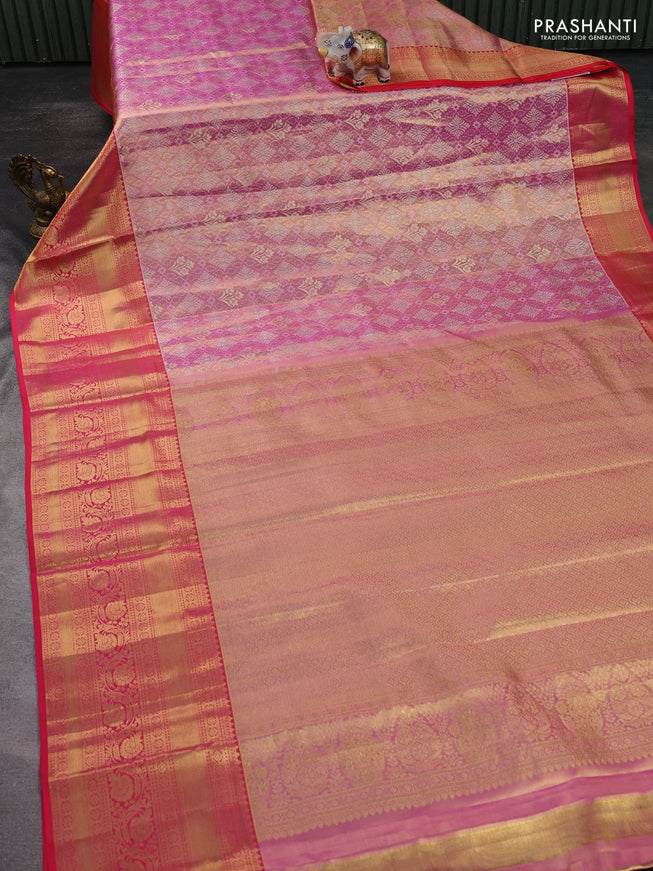 Pure kanchipuram tissue silk saree light pink and peach pink with allover zari woven brocade weaves and zari woven border