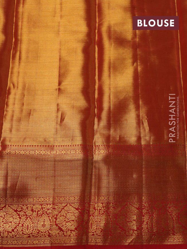Pure kanchipuram tissue silk saree dual shade of gold and red with allover zari woven brocade weaves and zari woven border