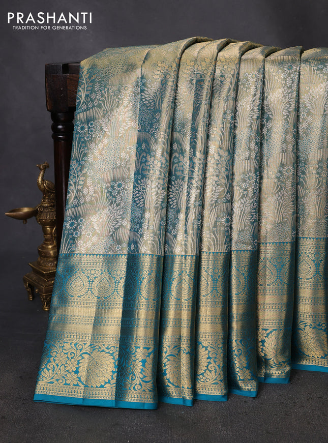 Pure kanchipuram tissue silk saree teal blue with allover zari woven brocade weaves and zari woven border