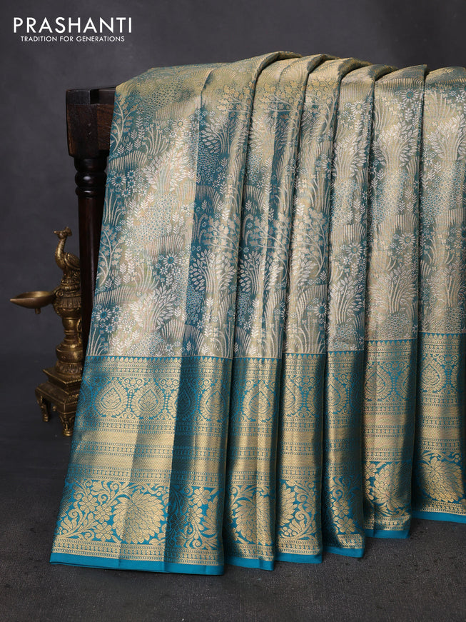 Pure kanchipuram tissue silk saree teal blue with allover zari woven brocade weaves and zari woven border