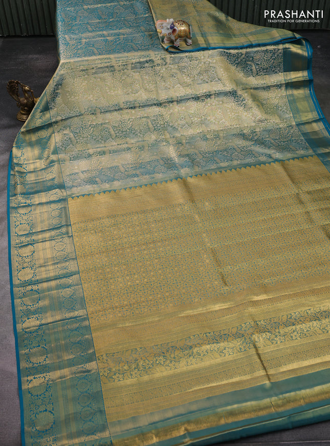 Pure kanchipuram tissue silk saree teal blue with allover zari woven brocade weaves and zari woven border