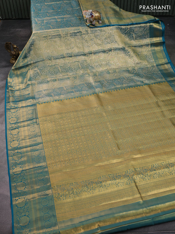 Pure kanchipuram tissue silk saree teal blue with allover zari woven brocade weaves and zari woven border