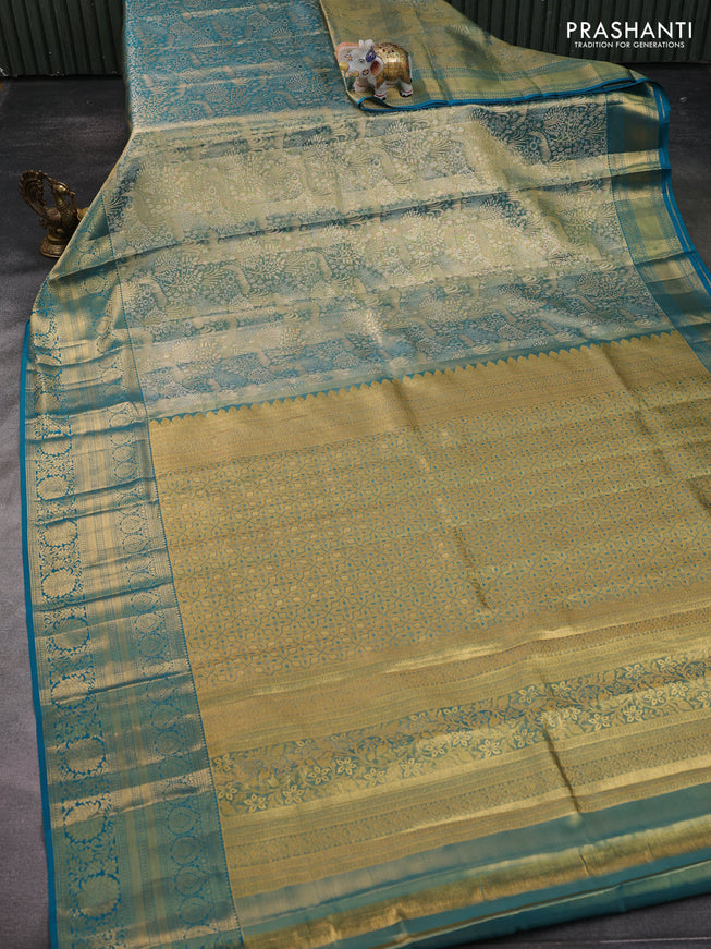 Pure kanchipuram tissue silk saree teal blue with allover zari woven brocade weaves and zari woven border