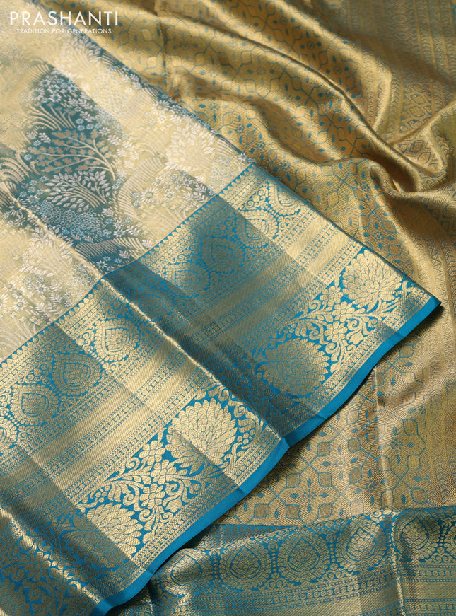 Pure kanchipuram tissue silk saree teal blue with allover zari woven brocade weaves and zari woven border