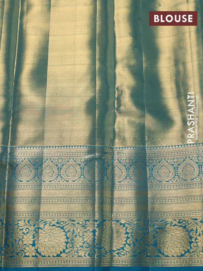 Pure kanchipuram tissue silk saree teal blue with allover zari woven brocade weaves and zari woven border