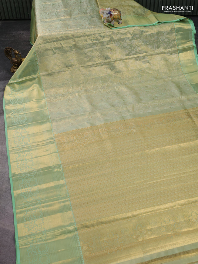 Pure kanchipuram tissue silk saree pista green with allover zari woven brocade weaves and zari woven border