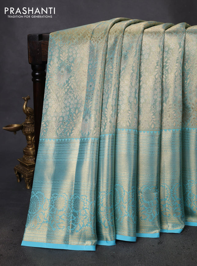 Pure kanchipuram tissue silk saree light blue with allover zari woven brocade weaves and zari woven border