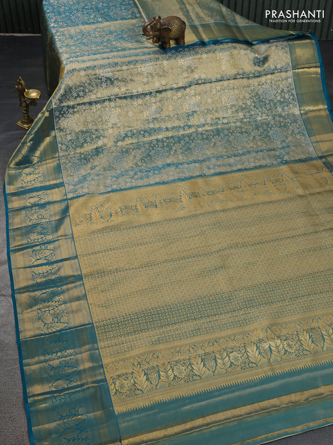 Pure kanchipuram tissue silk saree teal blue with allover zari woven brocade weaves and zari woven border