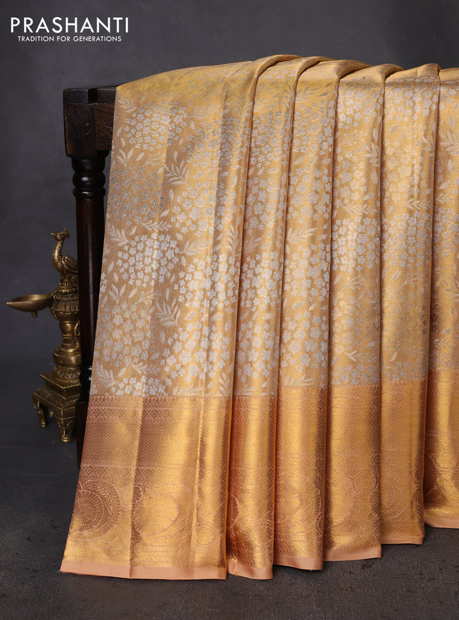 Pure kanchipuram tissue silk saree sandal with allover zari woven brocade weaves and zari woven border