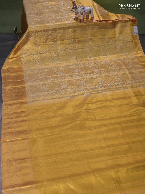 Pure kanchipuram tissue silk saree sandal with allover zari woven brocade weaves and zari woven border