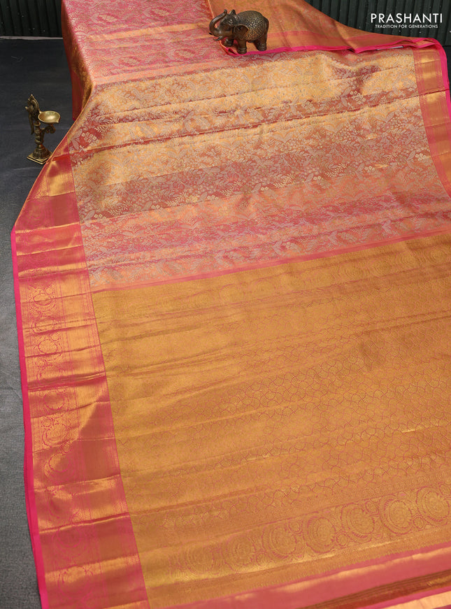 Pure kanchipuram tissue silk saree dual shade of peach pink with allover zari woven brocade weaves and zari woven border