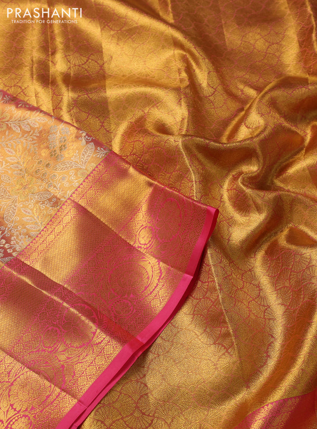 Pure kanchipuram tissue silk saree dual shade of peach pink with allover zari woven brocade weaves and zari woven border