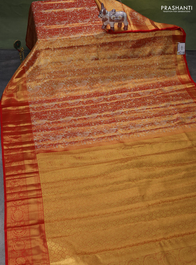 Pure kanchipuram tissue silk saree red shade with allover zari woven brocade weaves and zari woven border