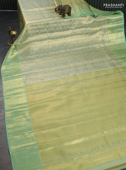 Pure kanchipuram tissue silk saree pista green with allover zari woven brocade weaves and zari woven border