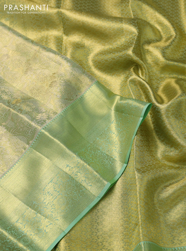 Pure kanchipuram tissue silk saree pista green with allover zari woven brocade weaves and zari woven border