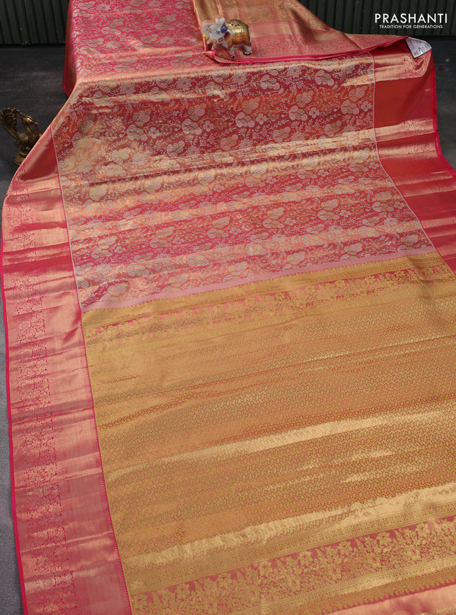 Pure kanchipuram tissue silk saree dual shade of peach pink with allover zari woven brocade weaves and zari woven border